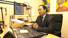 Retired Major Sonam Sherpa behind a Sonifex S2 Mixer